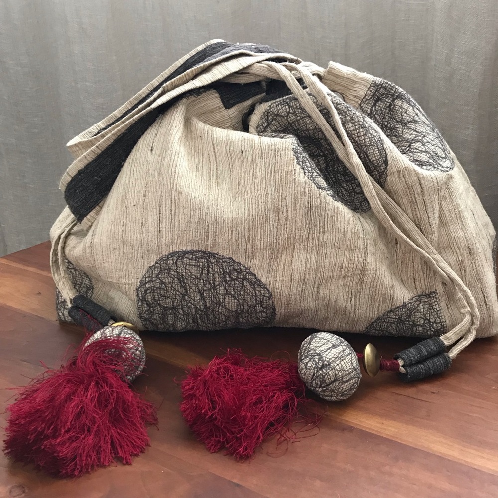 Embroidered tote with tassels
